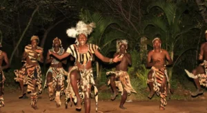 A group of Zambian traditional dancers in the middle of a dance