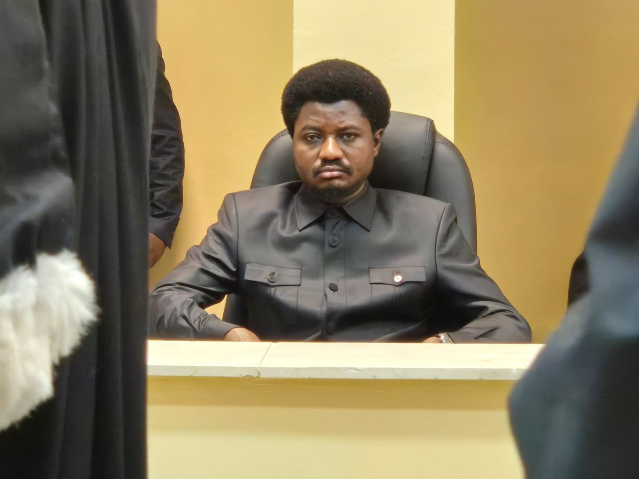 Democratic Republic of Congo Justice Minister Constant Mutamba in court during embezzlement proceedings related to $19 million Kisangani prison funds.